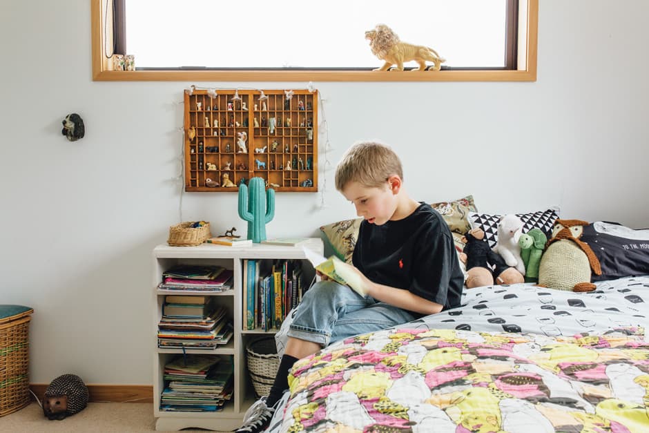 KIDS’ BEDROOMS Vintage pieces pepper the children’s spaces, where designer bed linen clashes in the best possible way with handcrafted coverings. Stacey says the kids are really benefiting from the new home’s beachy location. “We’ve been going on family bike rides and walks since moving here, down the boardwalk to the Mount or into town for dinner – the kids love it. Jake and the boys have also been loving walking down to go fishing off the rocks.”